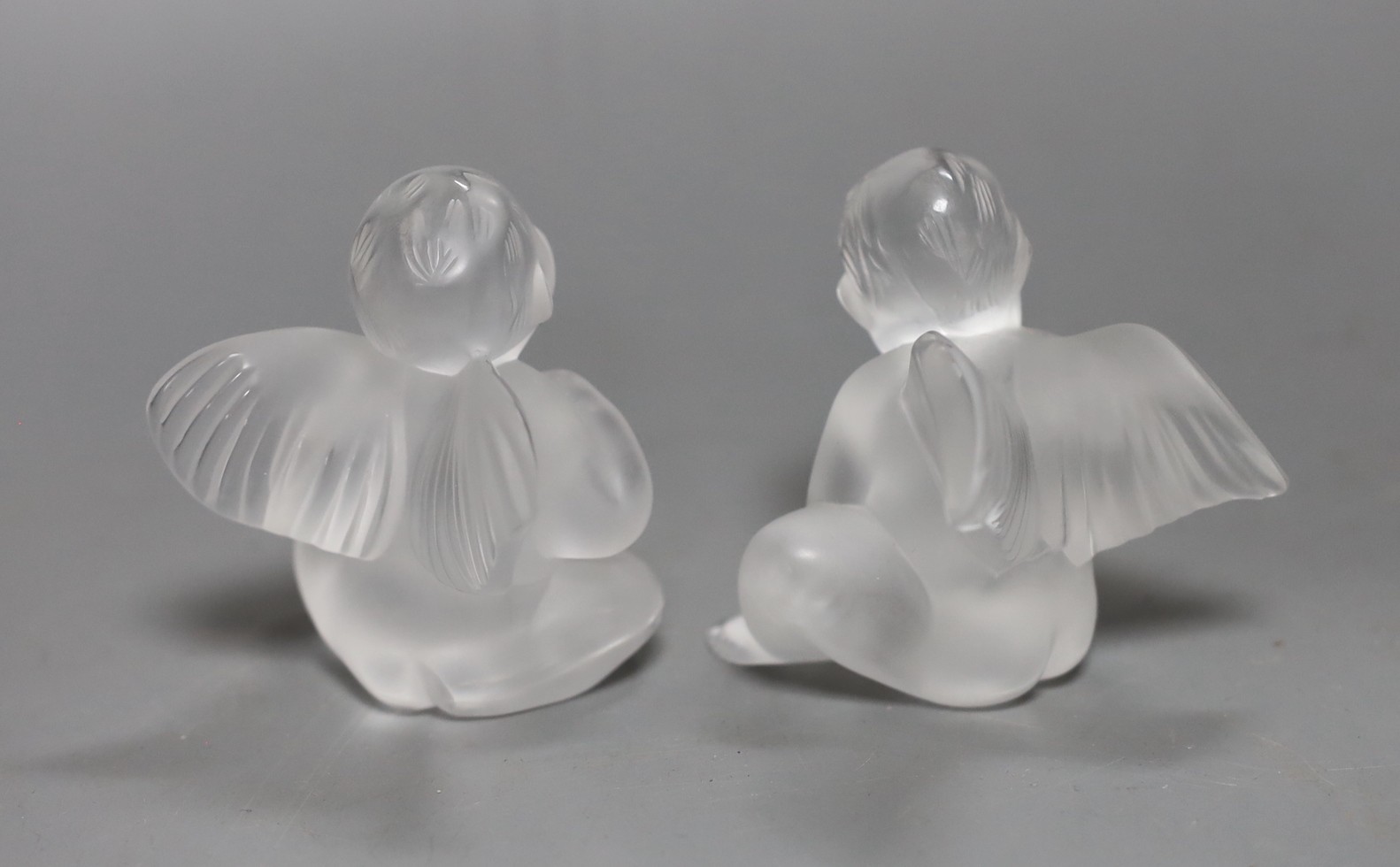 Two boxed Lalique glass cherub models, 7.5cm